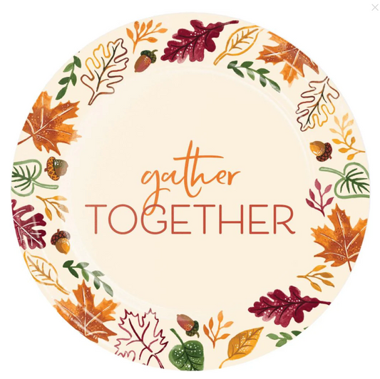 Round cream-colored ceramic dinner plate with autumn leaves and acorns border, "gather TOGETHER" text in orange and red.