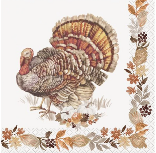 Square Thanksgiving napkin with detailed turkey illustration and decorative autumn leaves border in warm fall tones.