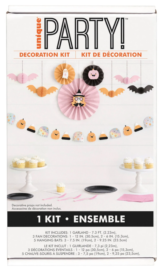 Groovy Halloween decor kit with pink, black, and orange paper fans, pumpkin and ghost garland, and cupcake toppers.