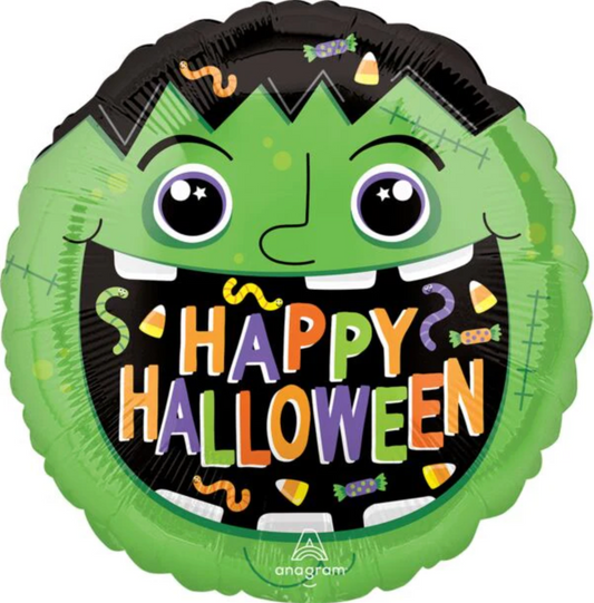 Green Frankenstein face foil balloon with stitched black hair and wide eyes, "Happy Halloween" text in colorful letters.