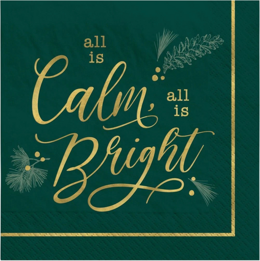 Green square luncheon napkin with gold foil script "all is Calm, all is Bright" and subtle pine and berry illustrations.