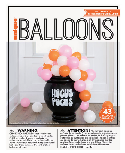Black cauldron-shaped balloon with "Hocus Pocus" text surrounded by orange, pink, and white balloons.