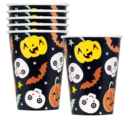 Set of six black paper cups with smiling pastel yellow, orange, and white Halloween pumpkin and skull designs, accented with