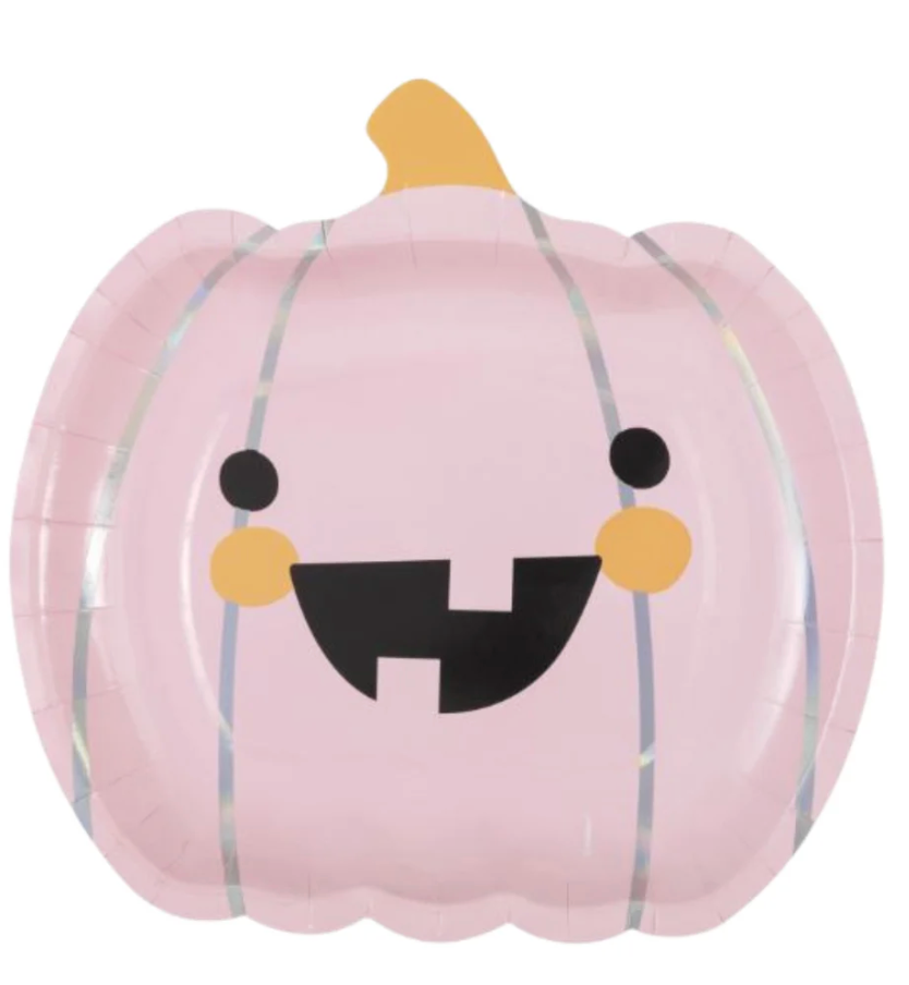 Pink pumpkin-shaped paper plate with smiling face, black eyes, yellow cheeks, and orange stem.