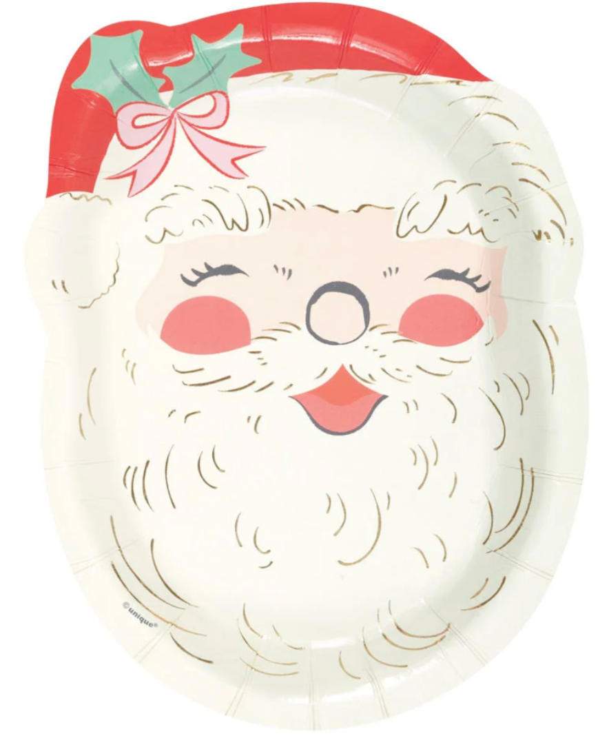 Santa-shaped paper plate with a vintage design, featuring a red hat, white beard, rosy cheeks, and holly decoration.