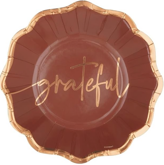 Brown scalloped paper plate with gold foil edge and "grateful" lettering in gold cursive, 8.25 inches.