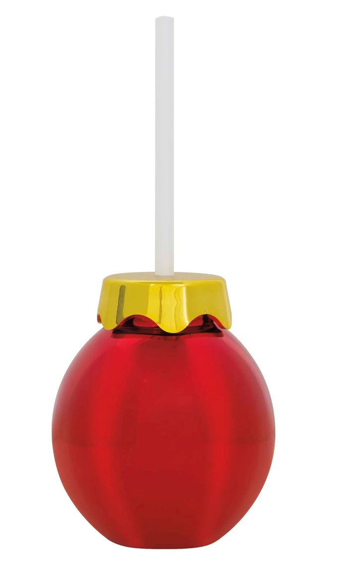 Red Christmas ornament-shaped cup with a shiny gold lid and a white straw.