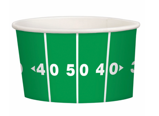 Green paper treat cup with white football field yard lines and numbers 40 and 50.