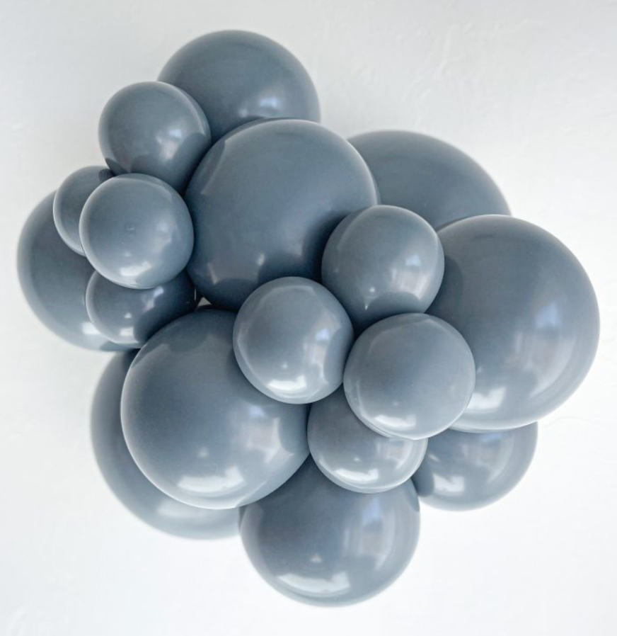Cluster of glossy gray latex balloons in various sizes with a smooth finish.