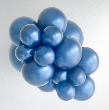 Cluster of pearlized midnight blue 5-inch latex balloons with a metallic sheen.