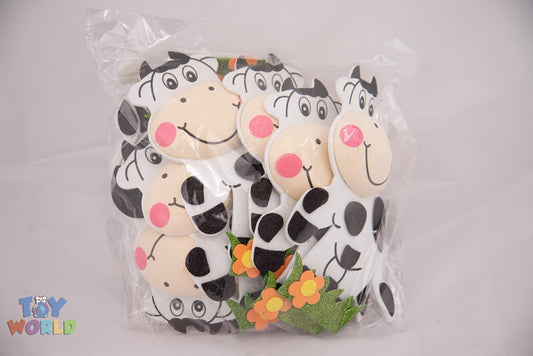 Set of three plush black and white spotted cows with pink cheeks made from soft EVA foam.