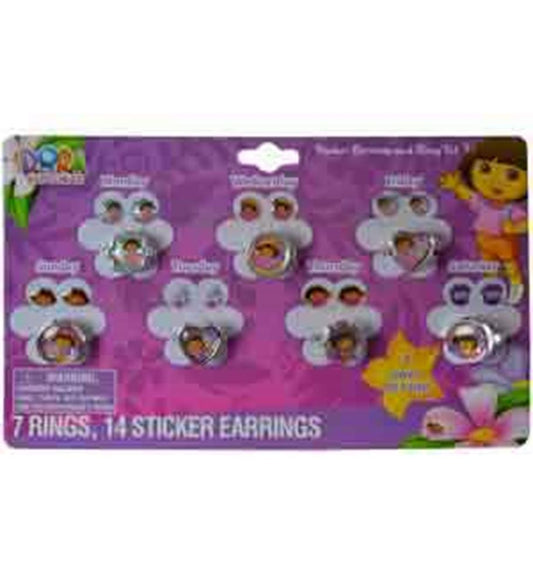 Kids' Dora the Explorer 7-day ring and earring set with colorful plastic jewelry on purple card.