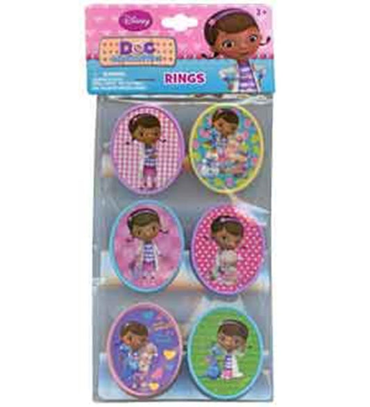 Six colorful cupcake topper rings featuring Doc McStuffins in various poses with patterned backgrounds.