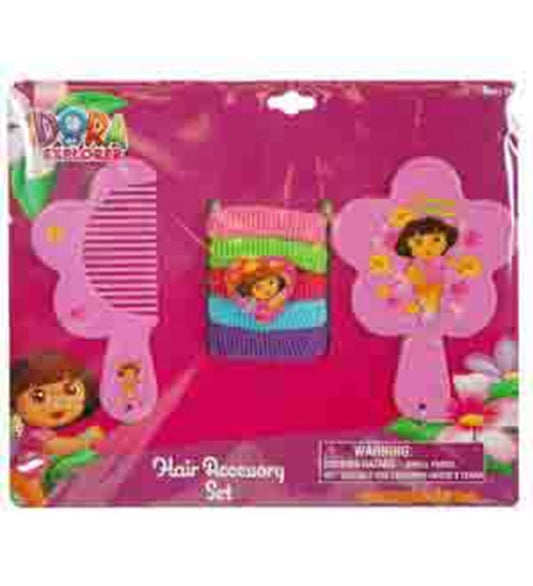 Pink flower-shaped comb and mirror with Dora the Explorer design, plus colorful hair ponies in green, blue, pink, and purple.