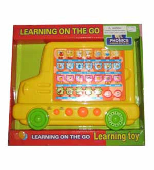 Yellow plastic school bus toy with colorful alphabet buttons and green wheels in red packaging.