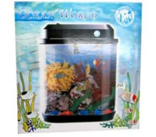 Oval tabletop aquarium with black lid, colorful coral decor, and small tropical fish inside.