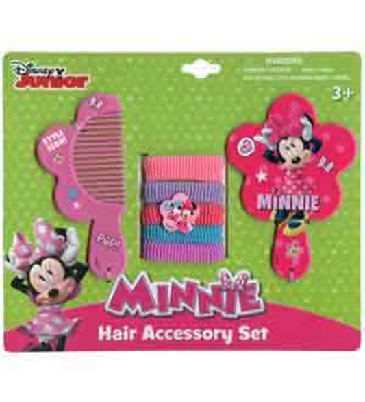Pink Minnie Mouse-shaped comb and hand mirror with matching pink and blue striped hair ties on green backing card.