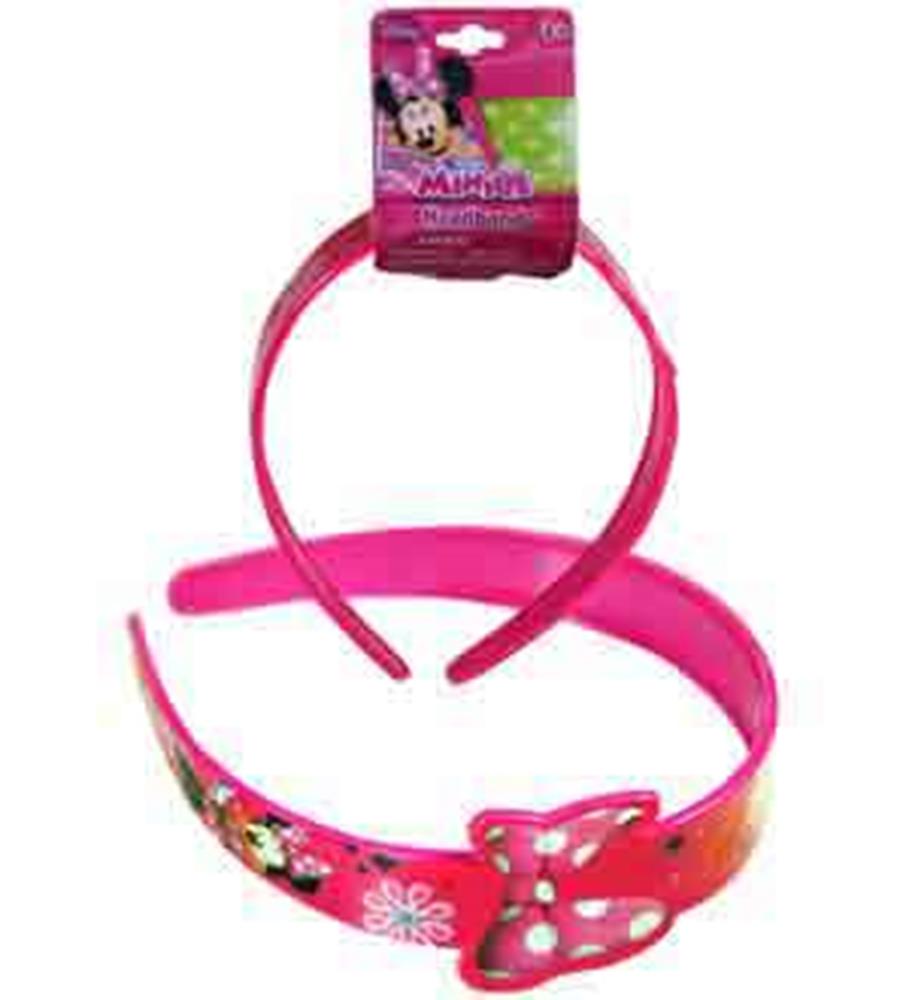 Bright pink plastic headband with Minnie Mouse print and white polka-dotted bow detail.