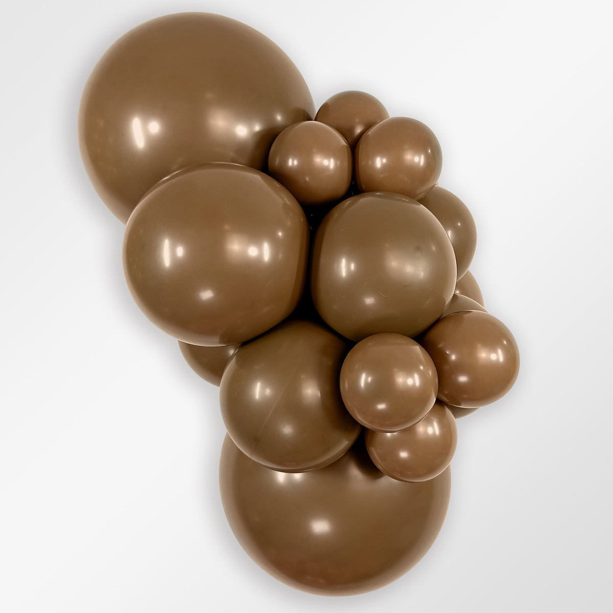Sempertex Deluxe Coffee latex balloon color cluster showing the shade across multiple balloon sizes