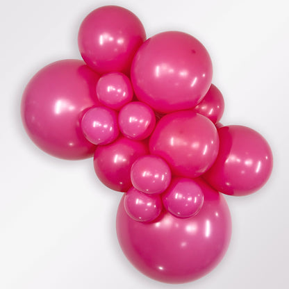 Sempertex Deluxe Fuchsia latex balloon color cluster showing the shade across multiple balloon sizes