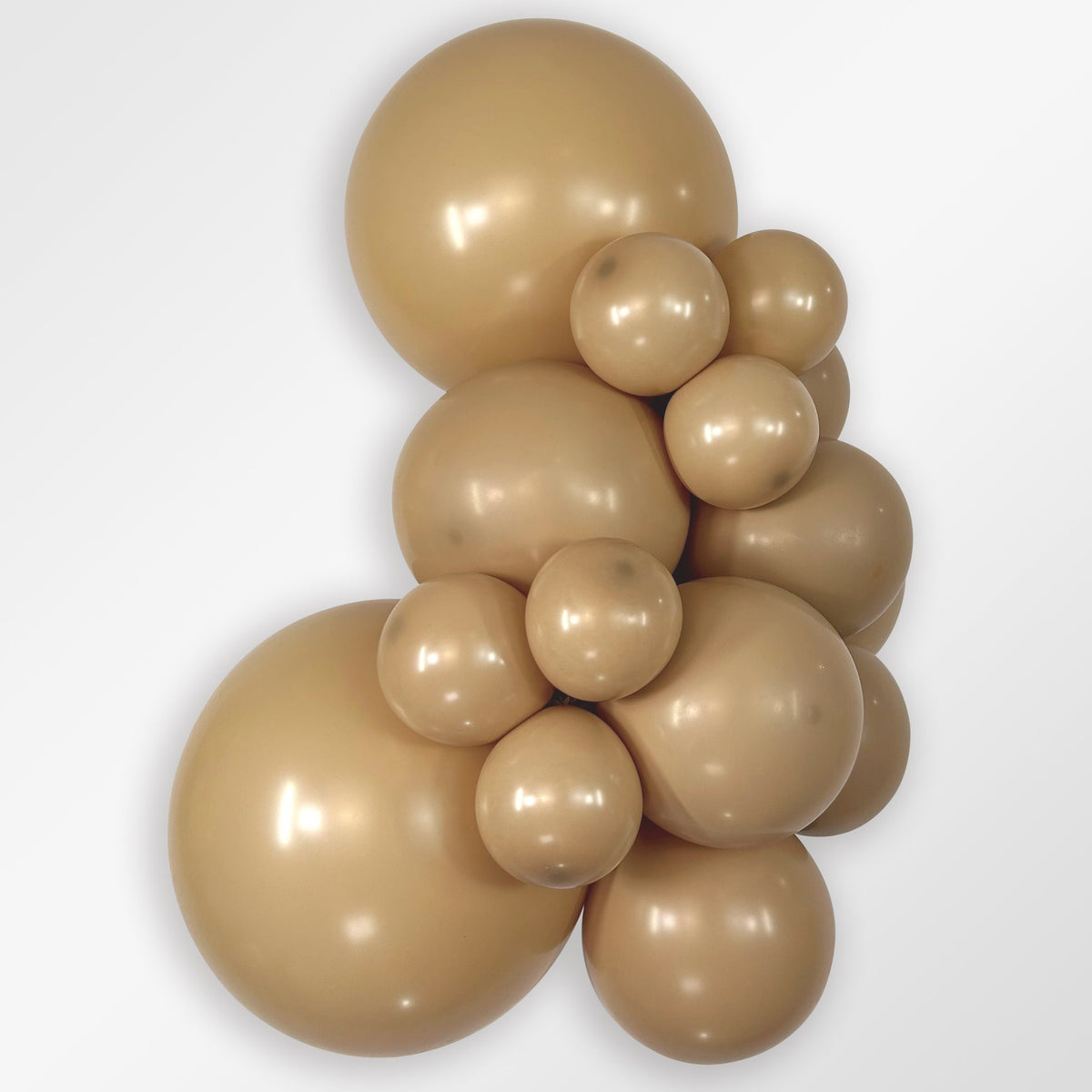 Sempertex Deluxe Latte latex balloon color cluster showing the shade across multiple balloon sizes
