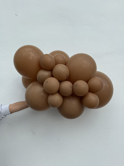 Sempertex Deluxe Mocha latex balloon color cluster showing the shade across multiple balloon sizes