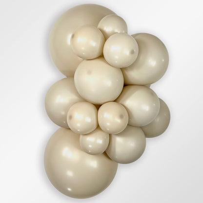 Sempertex Deluxe White Sand latex balloon color cluster showing the shade across multiple balloon sizes