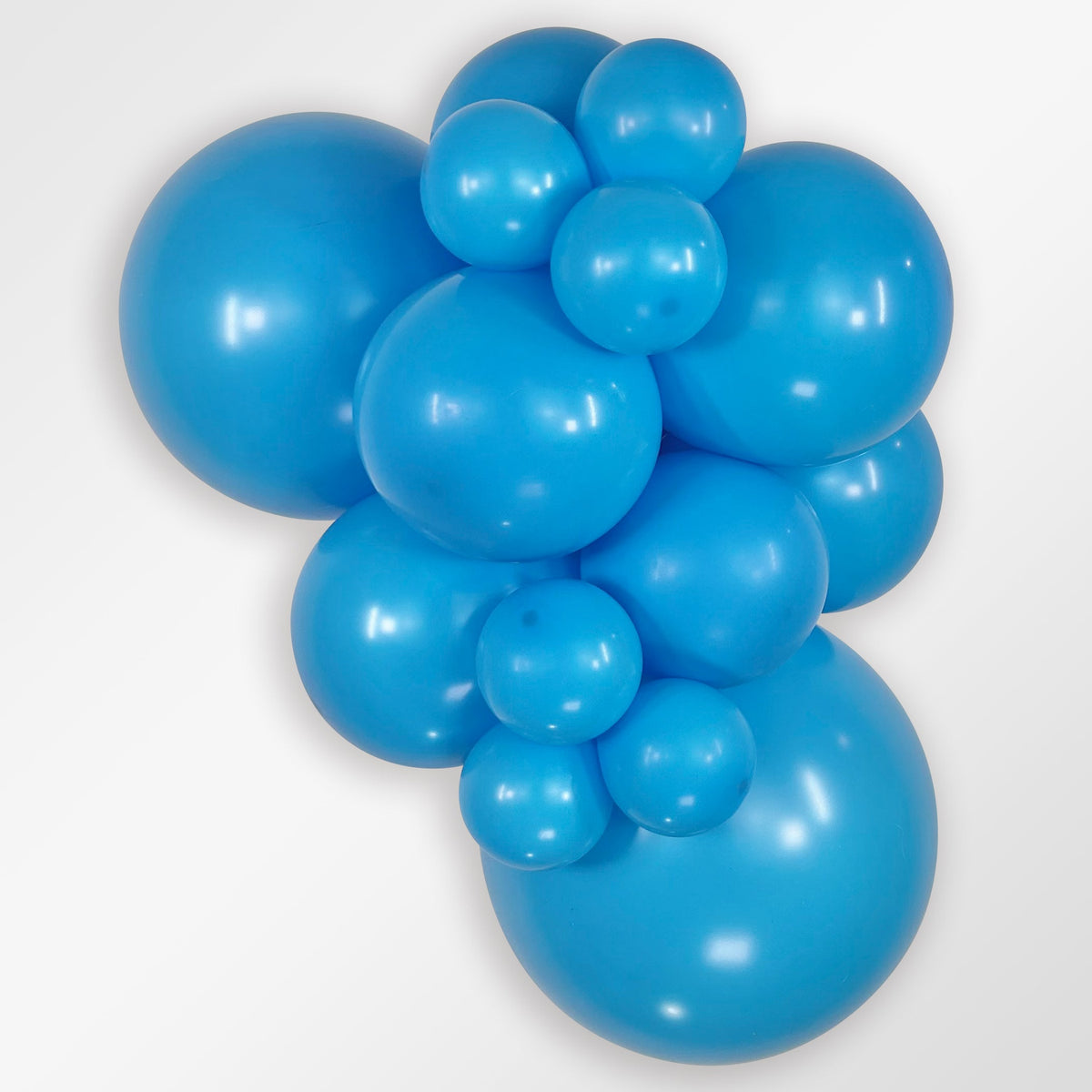 Sempertex Fashion Blue latex balloon color cluster showing the shade across multiple balloon sizes