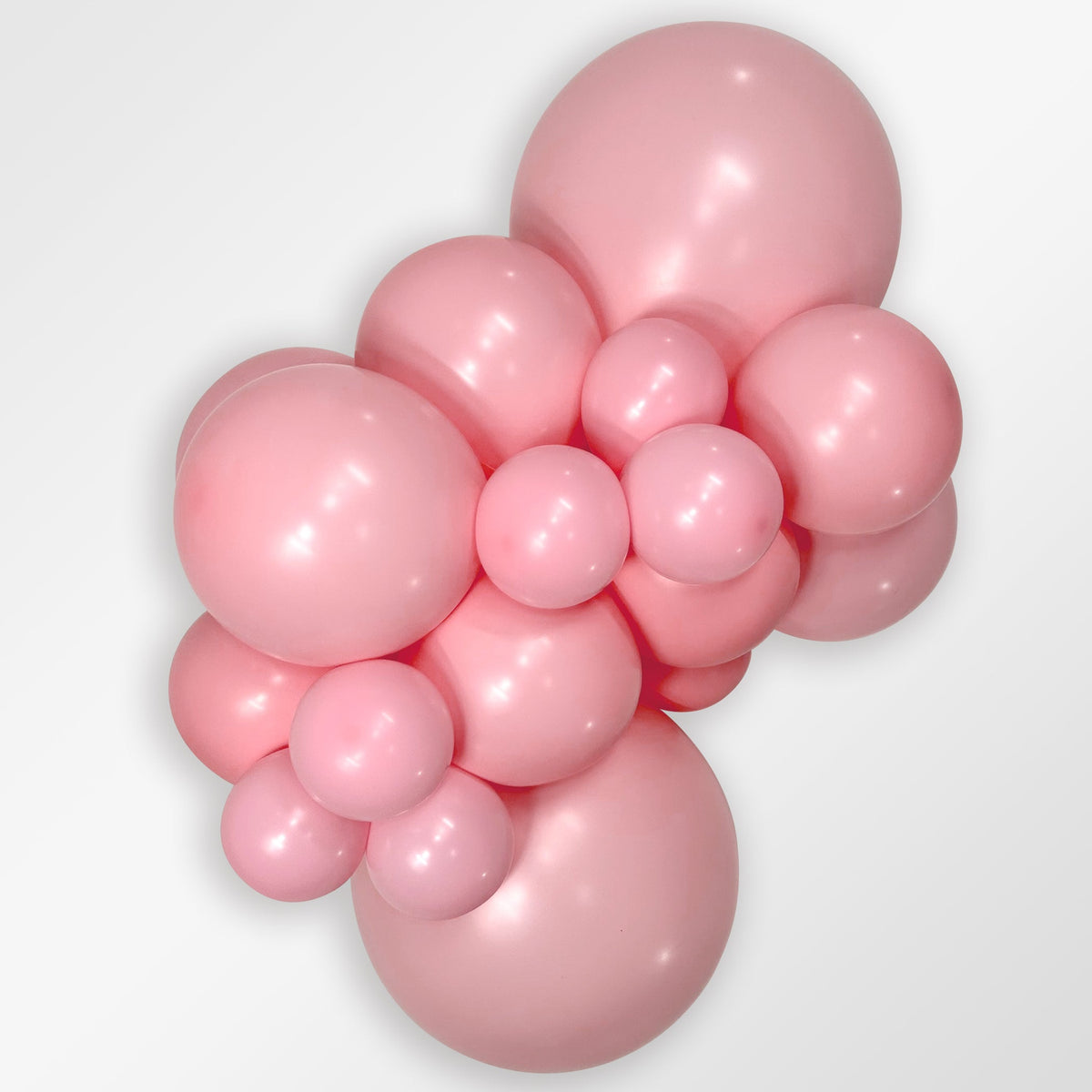 Sempertex Fashion Bubble Gum Pink latex balloon color cluster showing the shade across multiple balloon sizes