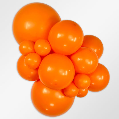 Sempertex Fashion Orange latex balloon color cluster showing the shade across multiple balloon sizes