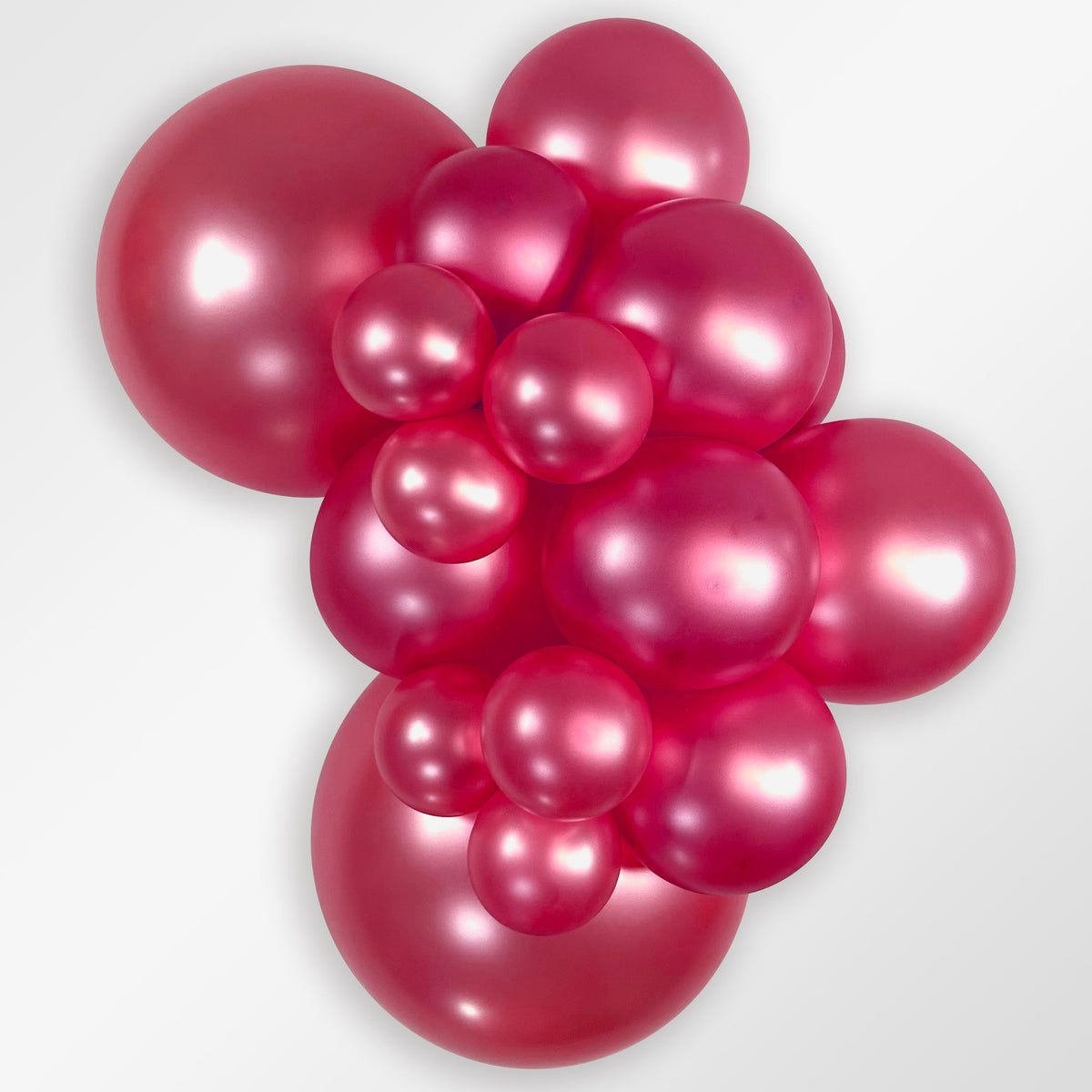 Sempertex Metallic Fuchsia latex balloon color cluster showing the shade across multiple balloon sizes