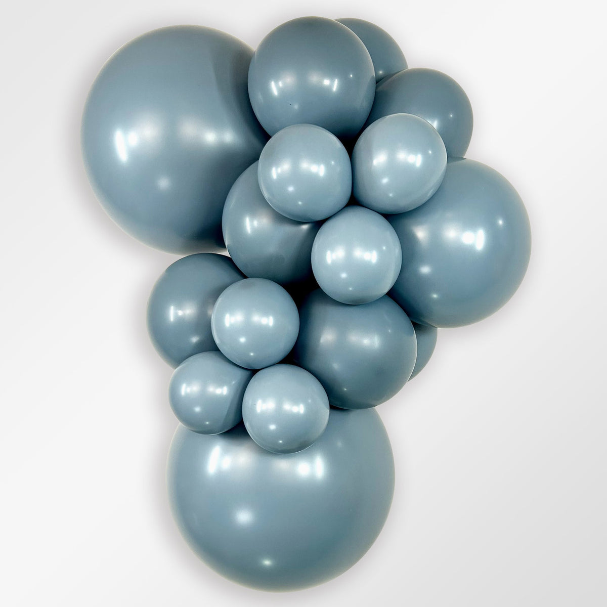 Sempertex Pastel Dusk Blue latex balloon color cluster showing the shade across multiple balloon sizes