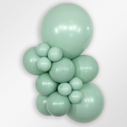 Sempertex Pastel Dusk Green Tea latex balloon color cluster showing the shade across multiple balloon sizes