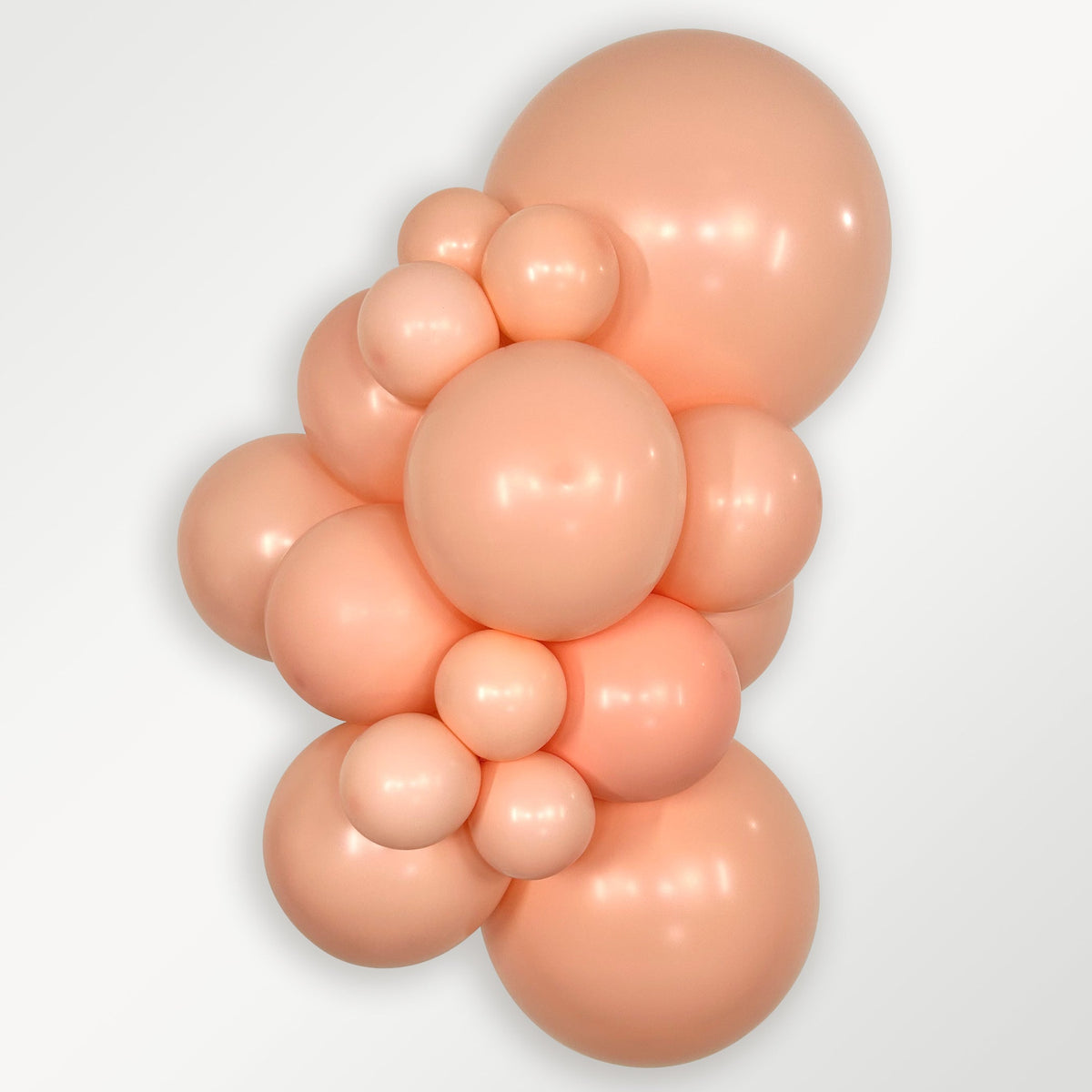Sempertex Pastel Matte Melon latex balloon color cluster showing the shade across multiple balloon sizes