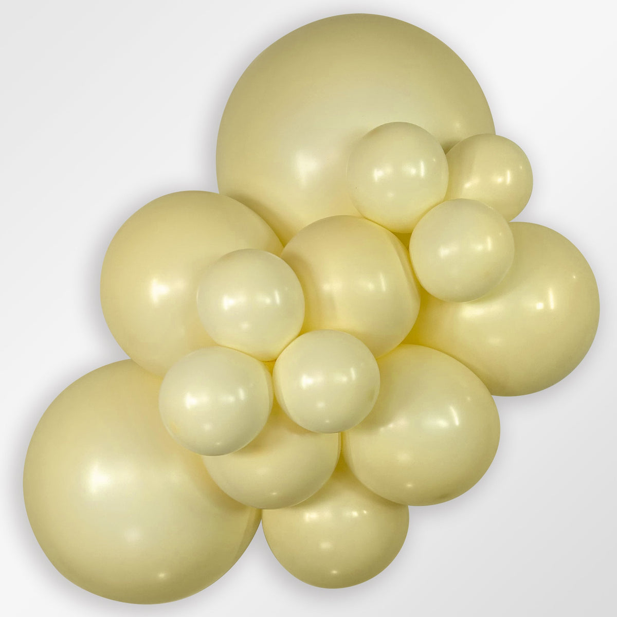 Sempertex Pastel Matte Yellow latex balloon color cluster showing the shade across multiple balloon sizes