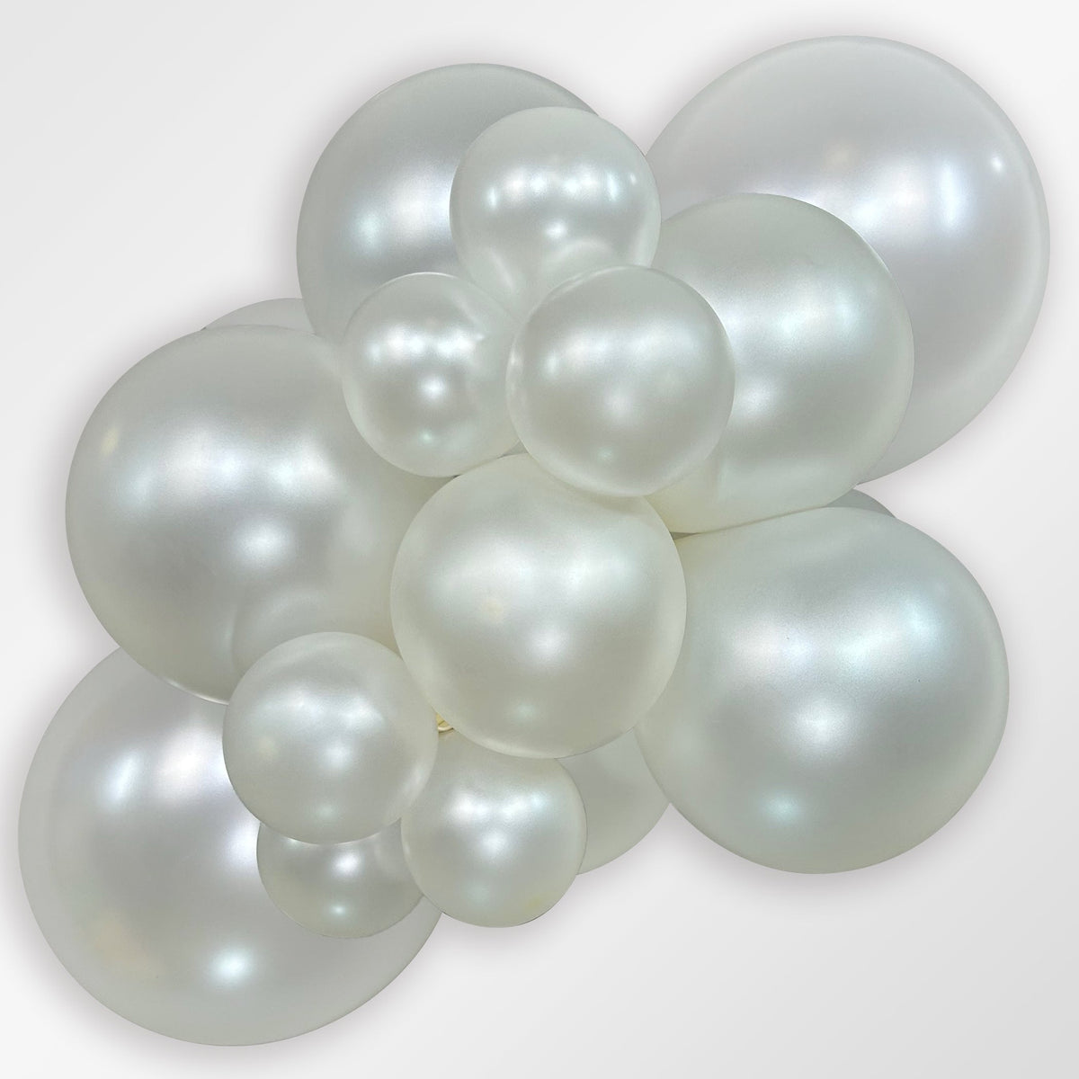 Sempertex Pearl White latex balloon color cluster showing the shade across multiple balloon sizes