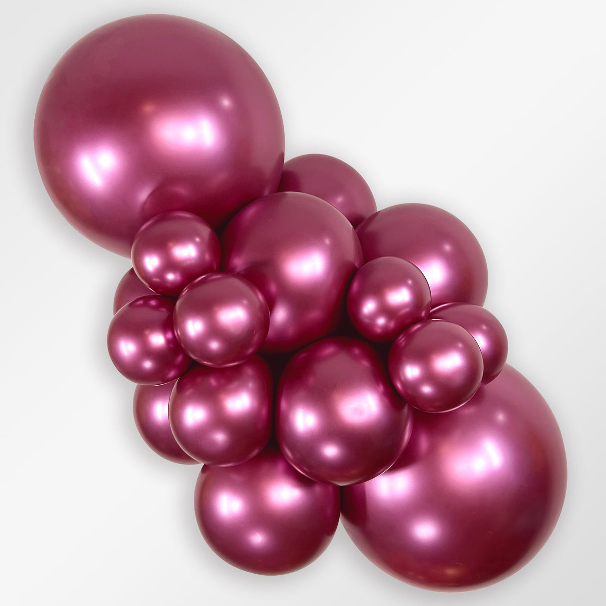 Sempertex Reflex Fuchsia latex balloon color cluster showing the shade across multiple balloon sizes