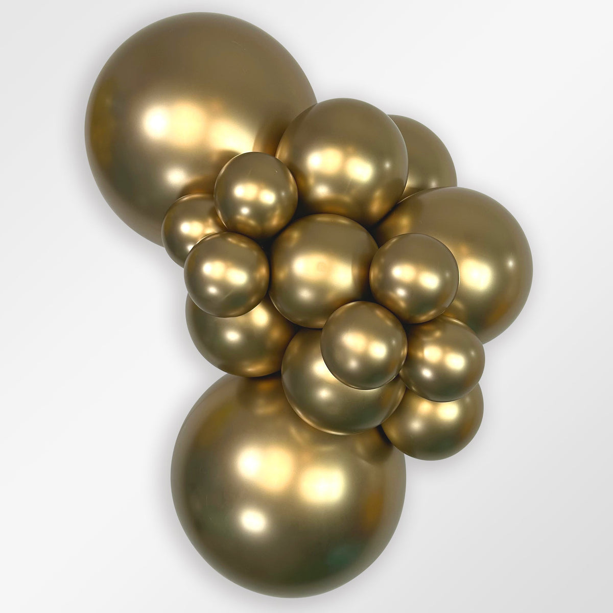 Sempertex Reflex Gold latex balloon color cluster showing the shade across multiple balloon sizes