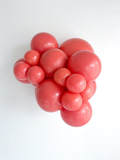 Tuftex Aloha latex balloon color cluster showing the shade across multiple balloon sizes