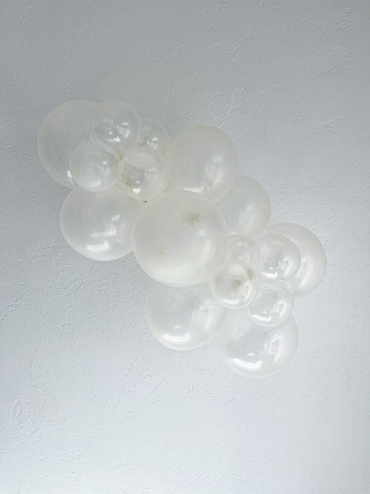 Tuftex Clear latex balloon color cluster showing the shade across multiple balloon sizes