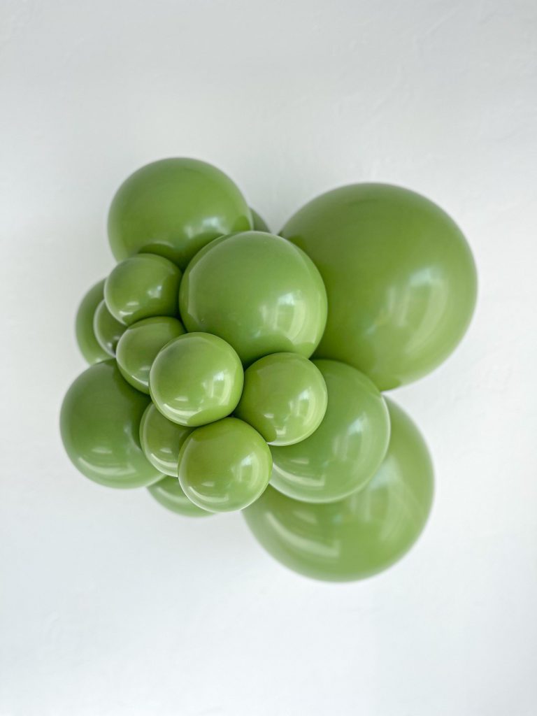 Tuftex Fiona latex balloon color cluster showing the shade across multiple balloon sizes