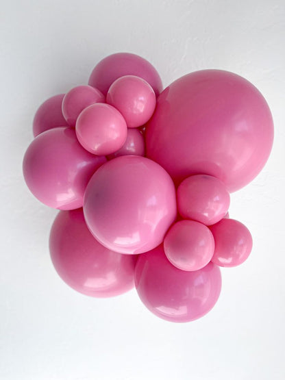 Tuftex Pixie latex balloon color cluster showing the shade across multiple balloon sizes