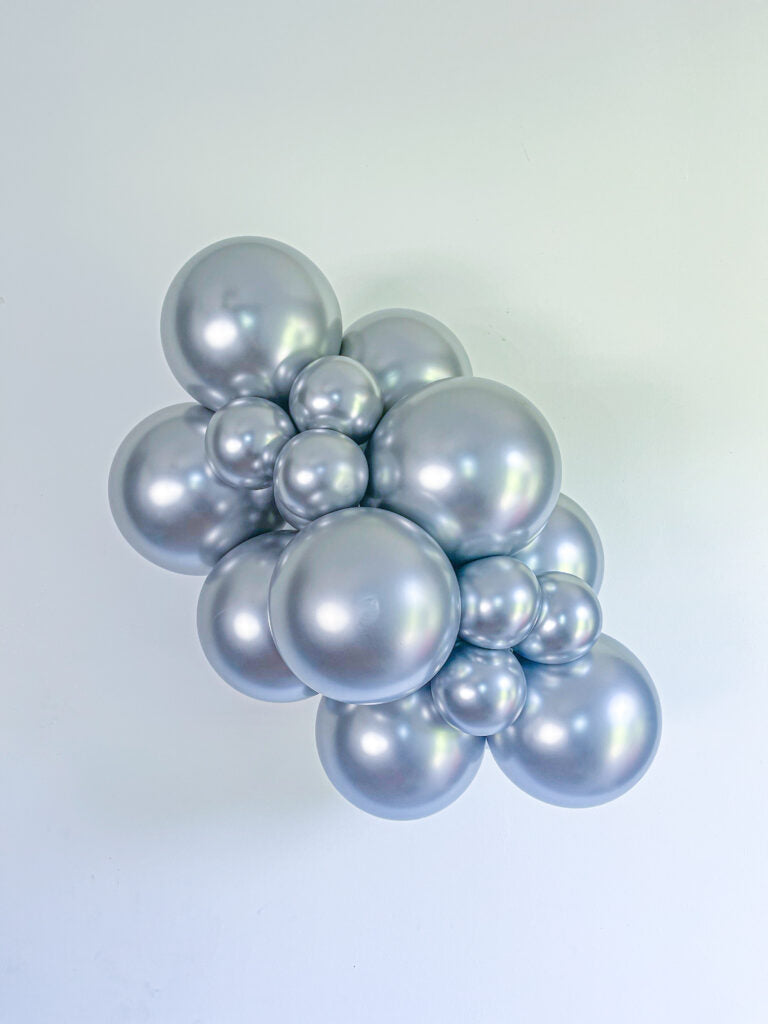 Tuftex Effects Silvery latex balloon color cluster showing the shade across multiple balloon sizes