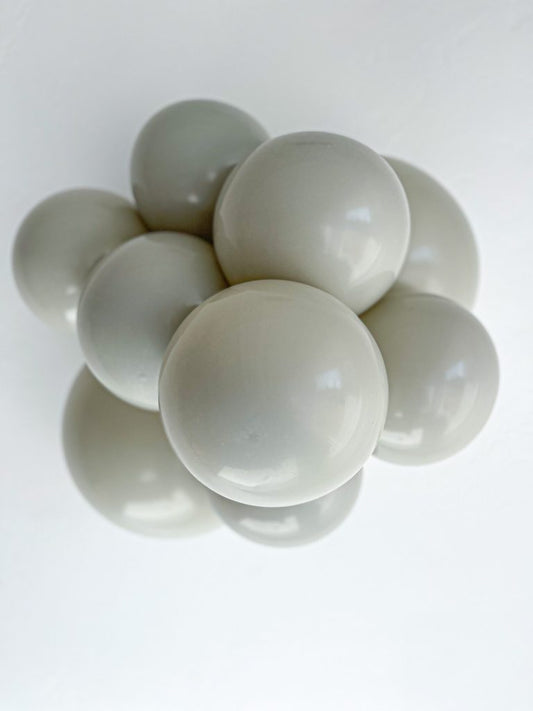 Tuftex Stone latex balloon color cluster showing the shade across multiple balloon sizes