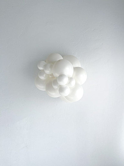 Tuftex Sugar latex balloon color cluster showing the shade across multiple balloon sizes