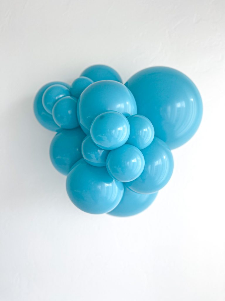 Tuftex Turquoise latex balloon color cluster showing the shade across multiple balloon sizes