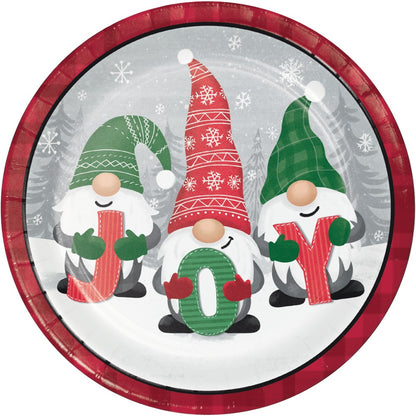 Round dinner plate with red plaid rim featuring three festive gnomes in green and red hats holding letters spelling "JOY".