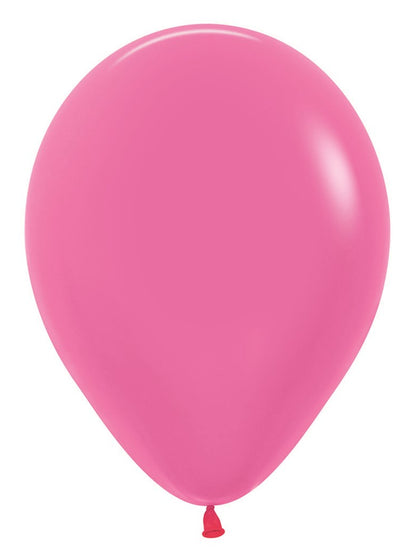 Bright neon magenta 5-inch latex balloon inflated, smooth surface, round shape with tied end.