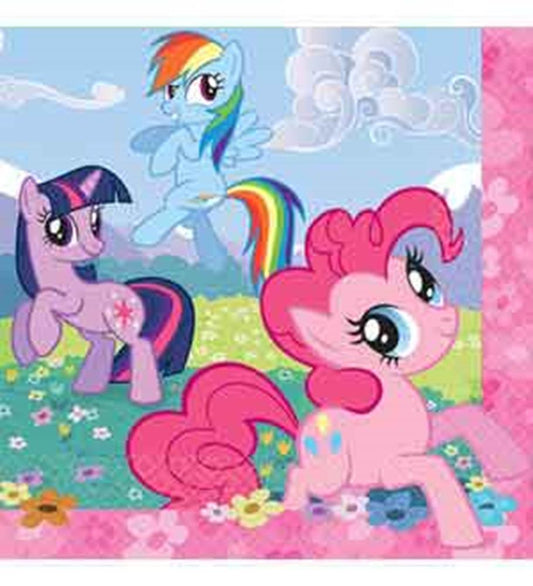 Colorful pink napkin featuring three My Little Pony characters with blue, purple, and rainbow manes on a floral and grassy.