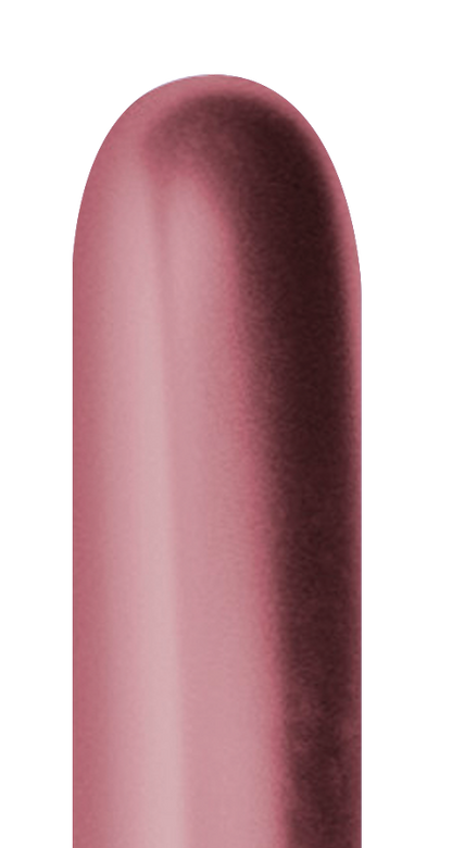 Glossy reflex pink elongated latex balloon deflated against white background.